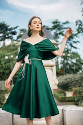 Silk midi dress with draped off-shoulder cape detail and flared A-line skirt